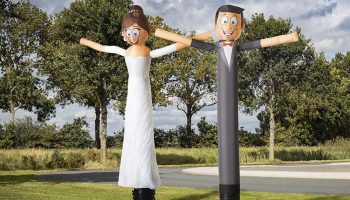 Happy Bride and Groom Sky Dancer Event Rentals